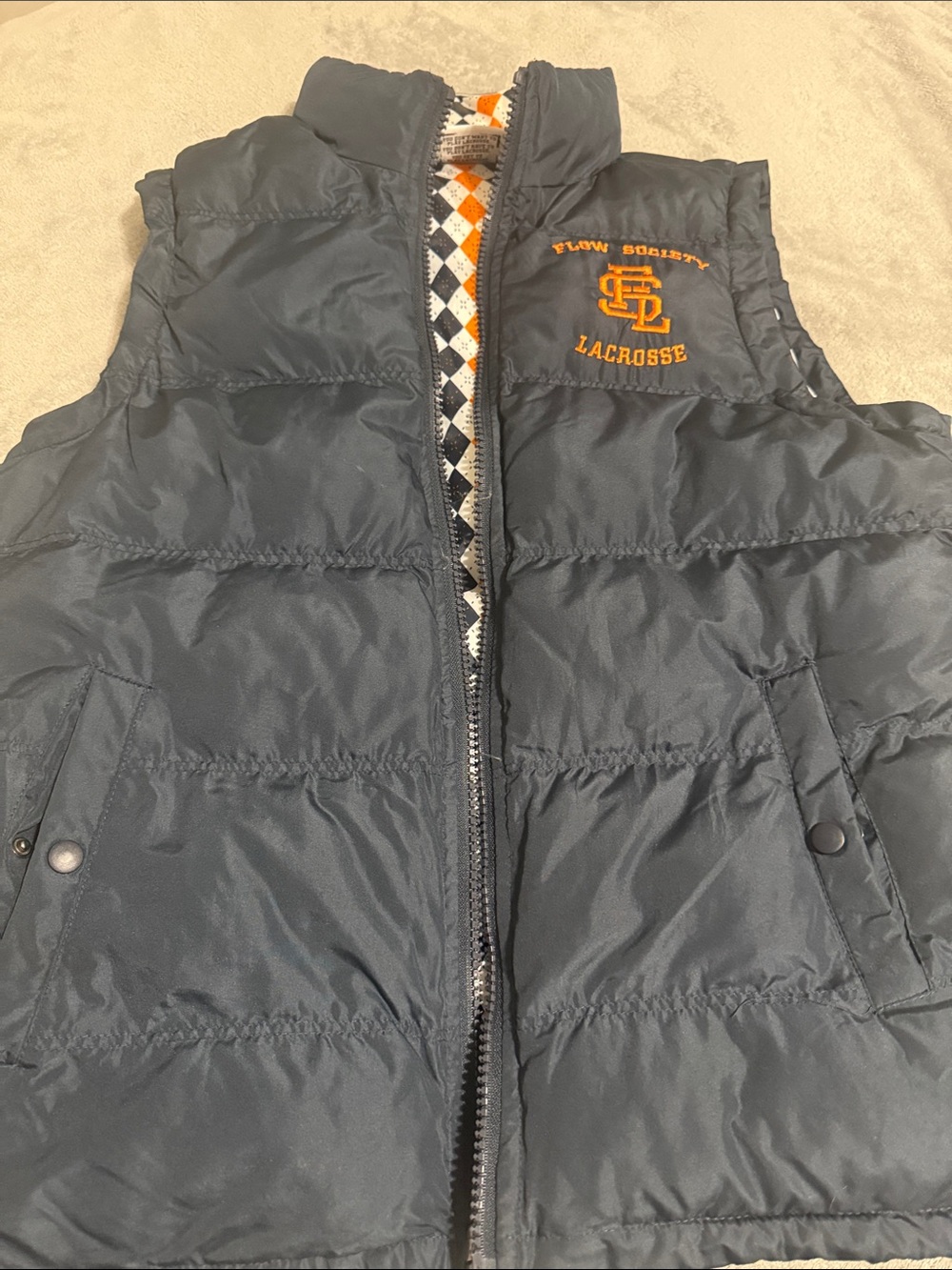 Kids Navy Puffer Vest with Orange Lacrosse Embroidery